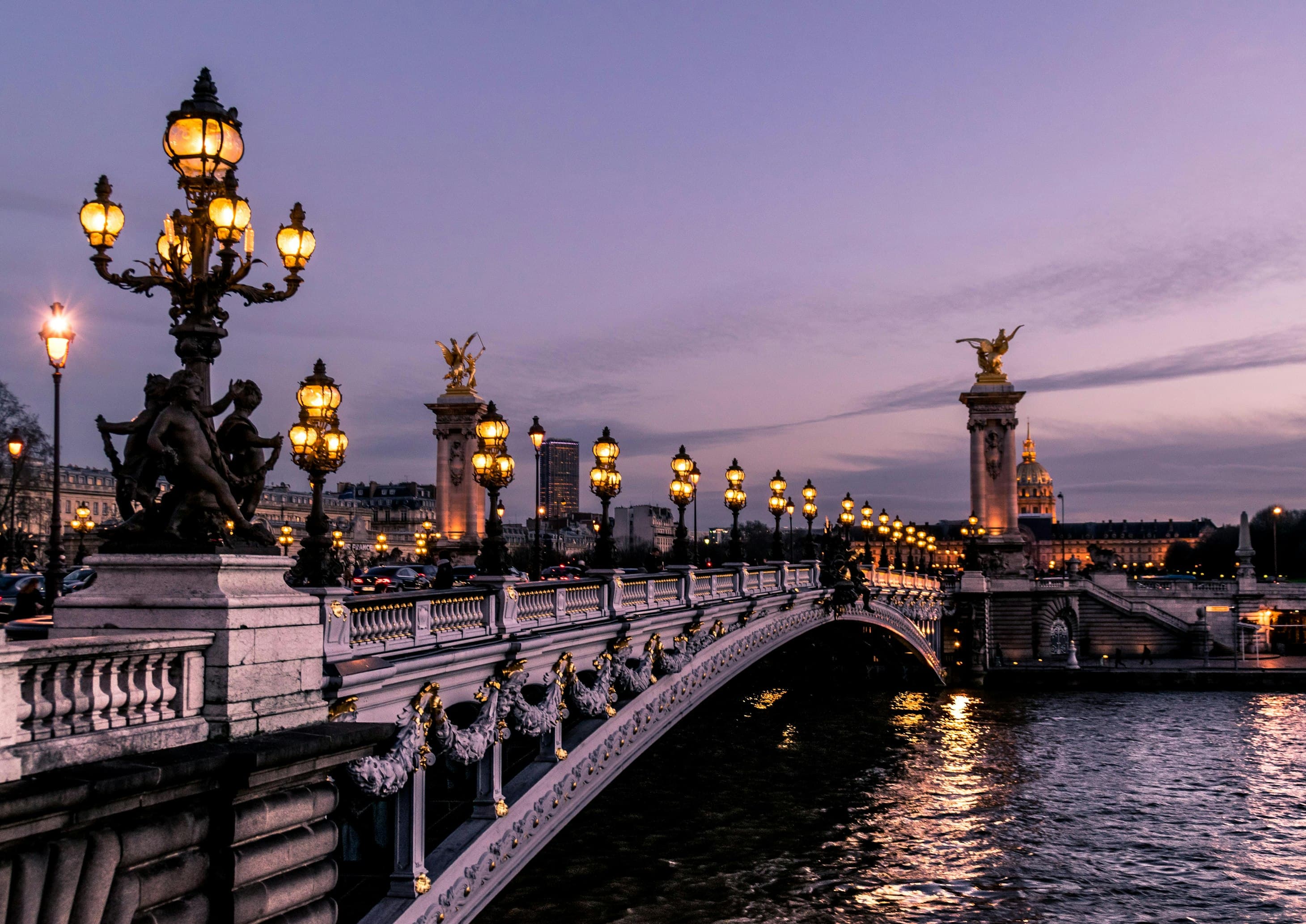 City lights along a bridge at dusk